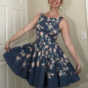 Pastel blue floral dress with flow-y skirt.